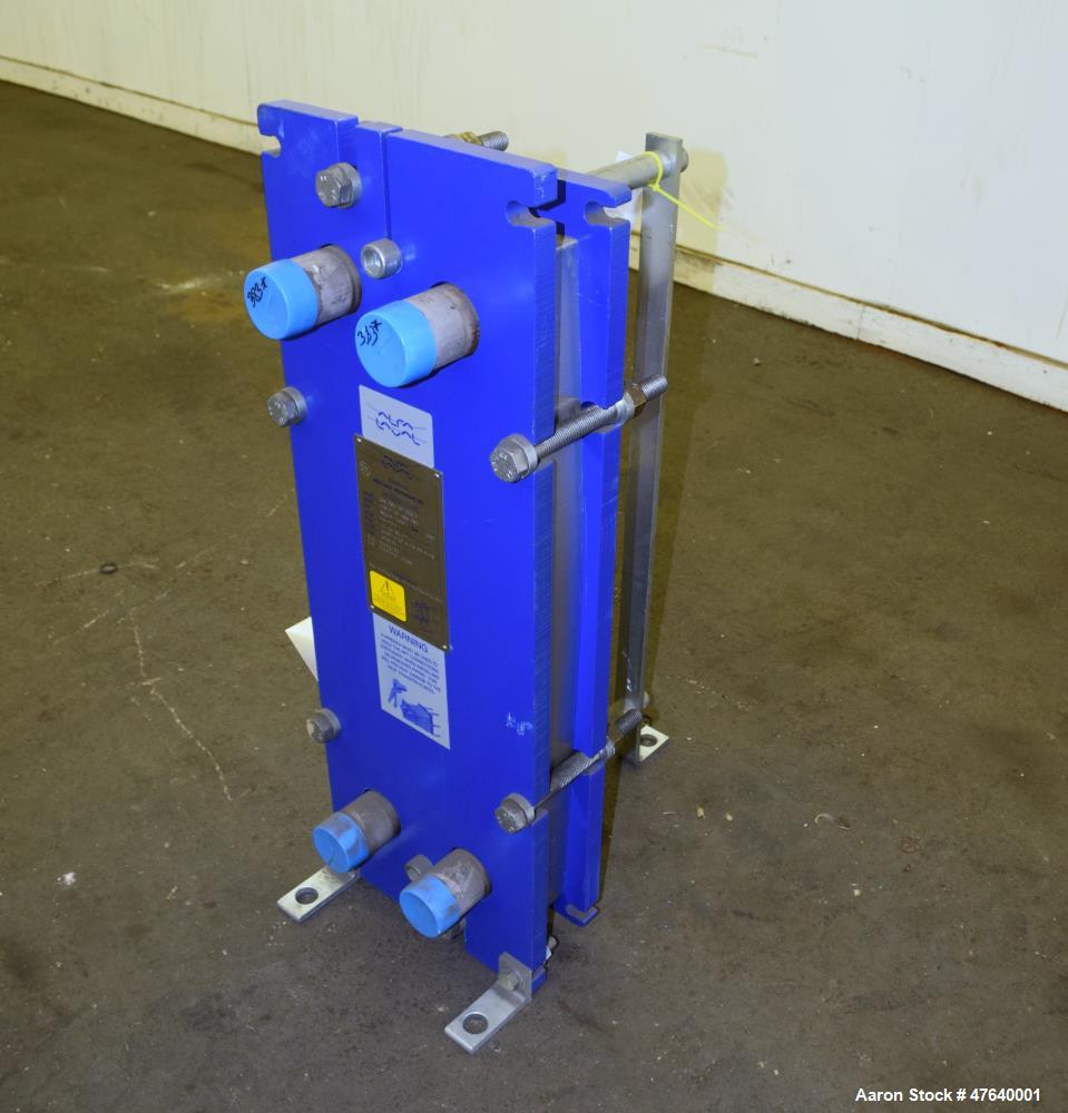 Unused- Alfa Laval Plate Exchanger, 24.11 Square Feet, Model M6-MDFG. (18) 0.75 mm thick 316 stainless steel plates. Designed 150 psi at -20 to 140 degrees F. (4) 2" Inlets & outlets. Mounted on a ca...