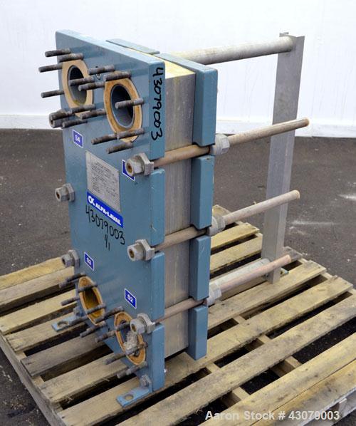 Used Alfa Laval Thermal Plate Exchanger, 59.25 Square Feet, Model M10-MFG. (25) 316 Stainless steel plates. Designed 150 psi at 225 degrees F. (2) 3” Inlets, (2) 3” Outlets. Mounted on a carbon steel...