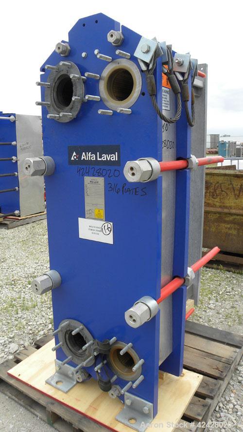 Used- Alfa Laval Thermal Plate Exchanger, 387.1 square feet, model M15-BFG. (58) Approximately 20-1/2’’ wide x 60’’ tall x 0...