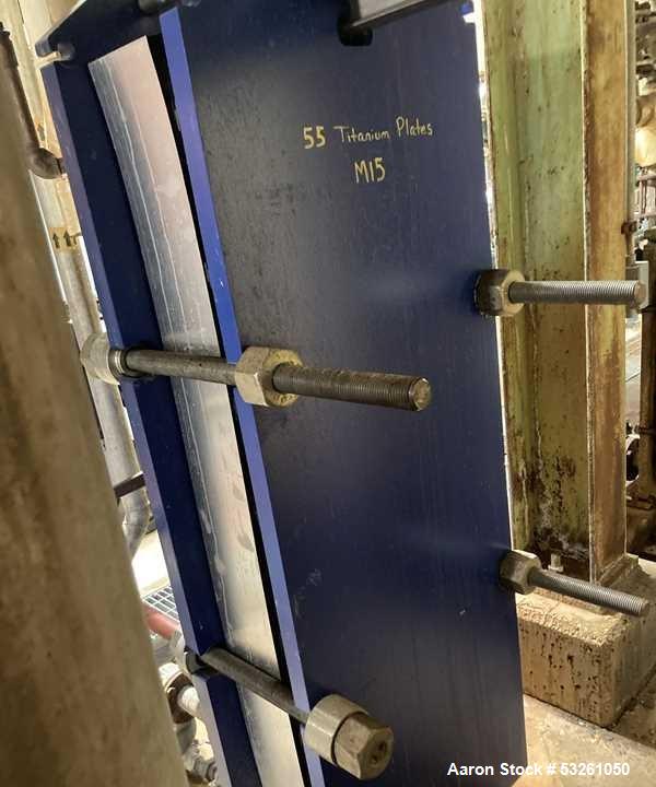 Used Alfa Laval Model M15-BFG TITANIUM 366.92 Sq. Ft. Plate Heat Exchanger. 366.92 Sq. Ft. according to the name plate. Marked as (55) Plates. Extra Plates available as spares.