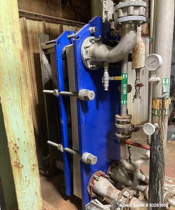 Used Alfa Laval Model M15-BFG TITANIUM 366.92 Sq. Ft. Plate Heat Exchanger. 366.92 Sq. Ft. according to the name plate. Marked as (55) Plates. Extra Plates available as spares.