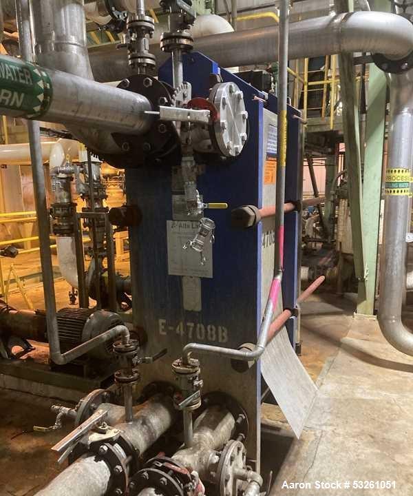 Used Alfa Laval Model M15-BFG Plate And Frame Heat Exchanger. 1207.2 square foot capacity. E-4708B. (181) 0.50mm stainless steel plates.