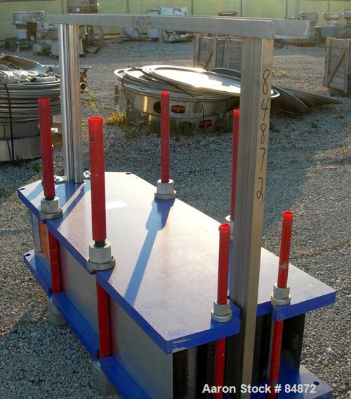 Unused-UNUSED: Alfa Laval gasketed plate heat exchanger, model M15-BFG, 727.4 sq ft, 316 stainless steel. Max flow rate 2000 gallons per minute. 109 approx 24" wide plates, rated 150 psi at 200 deg F...
