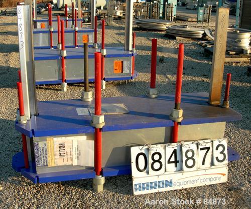 UNUSED- Alfa Laval Gasketed Plate Heat Exchanger, model M15-BFG, 727.4 square feet, 316 stainless steel. Max flow rate 2000 gallons per minute. 109 approximately 24" wide plates, rated 150 psi at 200...