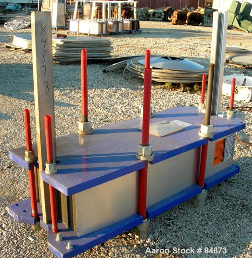 UNUSED- Alfa Laval Gasketed Plate Heat Exchanger, model M15-BFG, 727.4 square feet, 316 stainless steel. Max flow rate 2000 gallons per minute. 109 approximately 24" wide plates, rated 150 psi at 200...