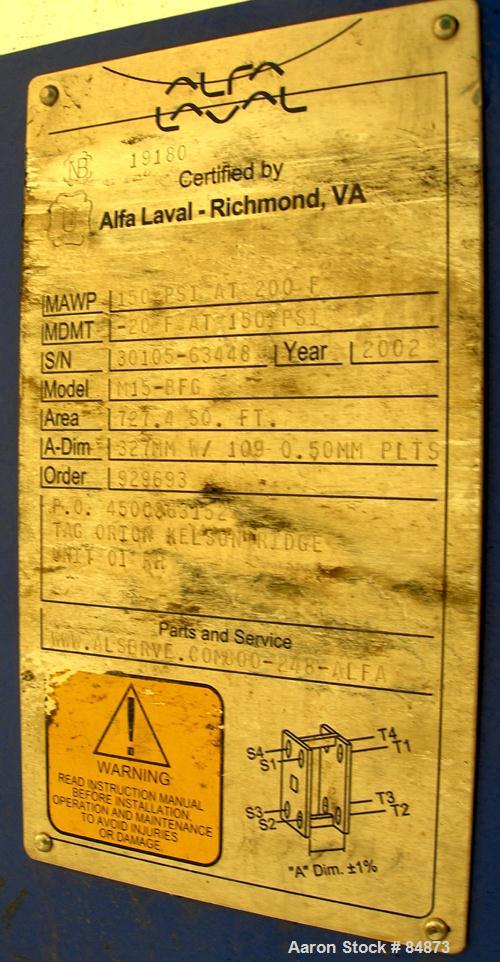 UNUSED- Alfa Laval Gasketed Plate Heat Exchanger, model M15-BFG, 727.4 square feet, 316 stainless steel. Max flow rate 2000 gallons per minute. 109 approximately 24" wide plates, rated 150 psi at 200...