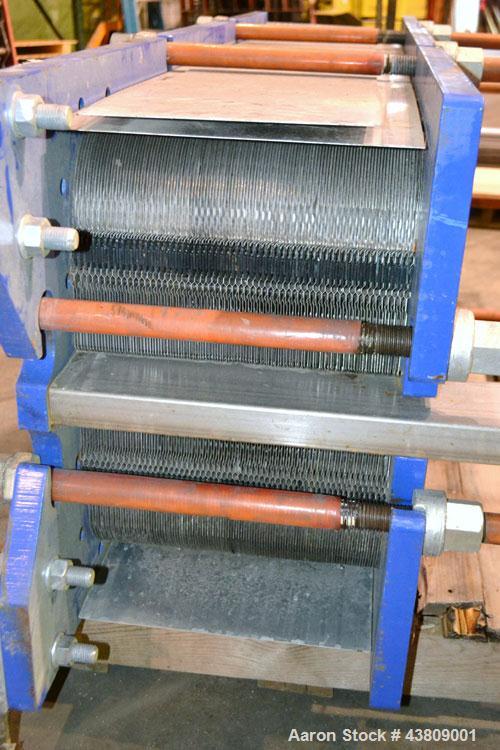 Used Alfa Laval Thermal Plate Exchanger, 743.6 Square Feet, Model M15-BFML. (114) 0.40 mm Thick 304 stainless steel plates. Designed 150 psi at -20 to 190 degrees F. (2) 6" Inlets, (2) 6" outlets. Mo...