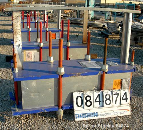 UNUSED- Alfa Laval Gasketed Plate Heat Exchanger, Model M15-MFG, 580.39 square feet, 316 stainless steel. Max flow rate 2000 gallons per minute. 89 approximately 24" wide plates, rated 150 psi at 210...