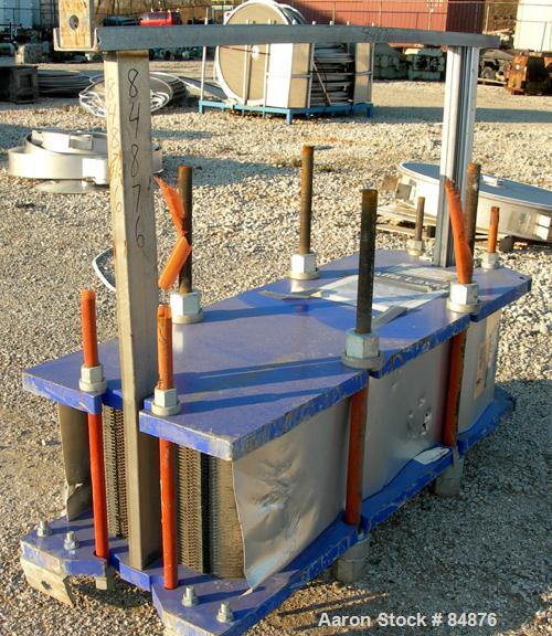 UNUSED- Alfa Laval Gasketed Plate Heat Exchanger, Model M15-MFG, 580.39 Square Feet, 316 Stainless Steel. Max flow rate 2000 gallons per minute. 89 approximately 24" wide plates, rated 150 PSI at 210...