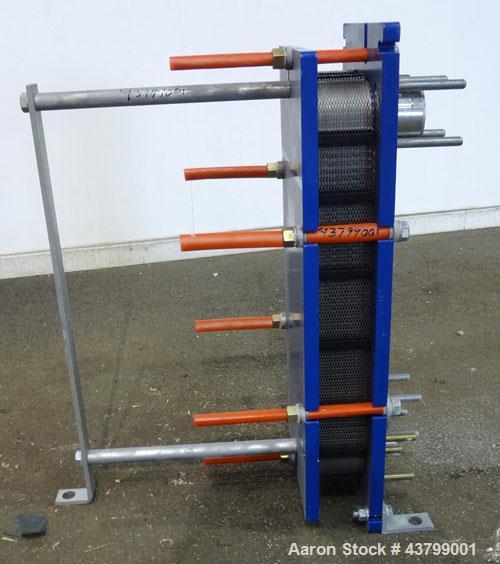 Unused- Alfa Laval Plate Exchanger, 61.35 Square Feet (5.7 Square Meters), Model M6-FG. (40) 316 Stainless steel plates. Designed 10 bar (145 psi) at 60 degrees C (140 F). (2) Inlets, (2) outlets. Mo...