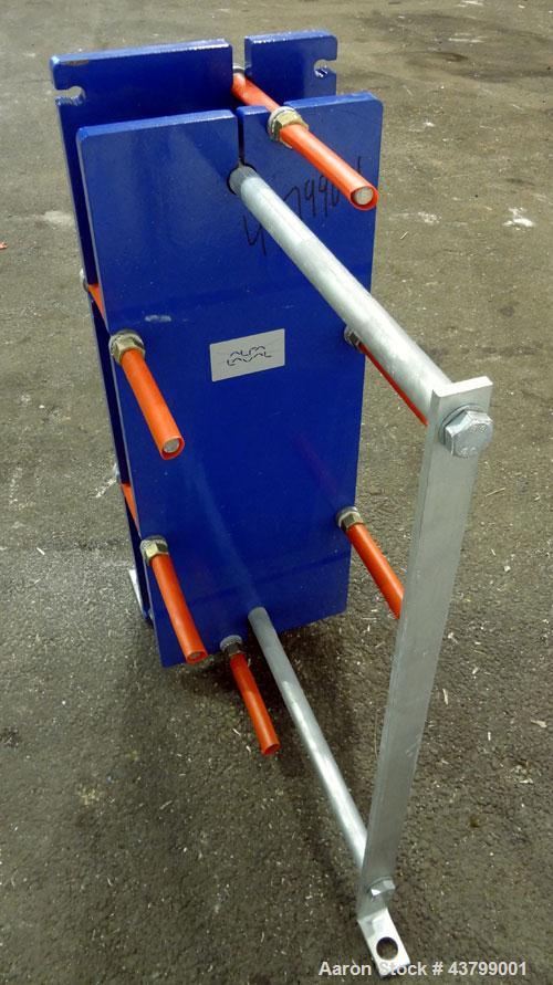 Unused- Alfa Laval Plate Exchanger, 61.35 Square Feet (5.7 Square Meters), Model M6-FG. (40) 316 Stainless steel plates. Designed 10 bar (145 psi) at 60 degrees C (140 F). (2) Inlets, (2) outlets. Mo...