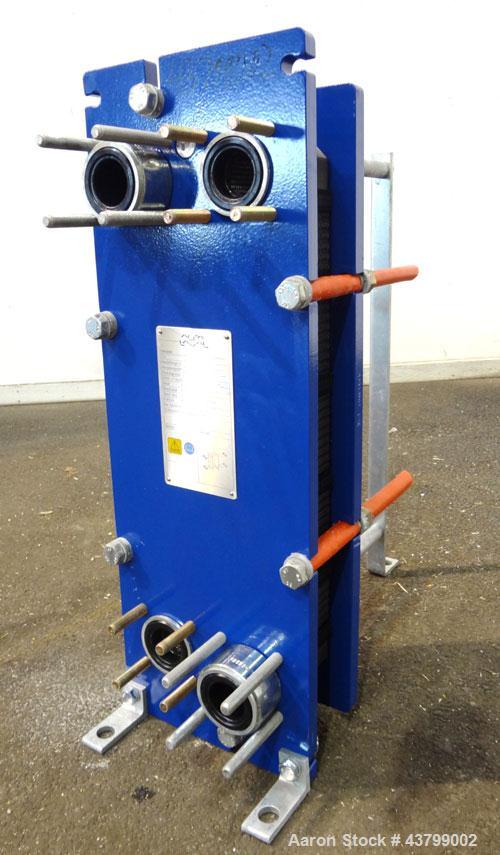 Unused- Alfa Laval Plate Exchanger, 61.35 Square Feet (5.7 Square Meters), Model M6-FG. (40) 316 Stainless steel plates. Designed 10 bar (145 psi) at 60 degrees C (140 F). (2) Inlets, (2) outlets. Mo...