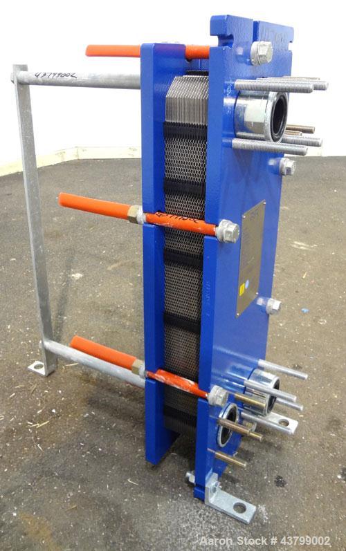 Unused- Alfa Laval Plate Exchanger, 61.35 Square Feet (5.7 Square Meters), Model M6-FG. (40) 316 Stainless steel plates. Designed 10 bar (145 psi) at 60 degrees C (140 F). (2) Inlets, (2) outlets. Mo...