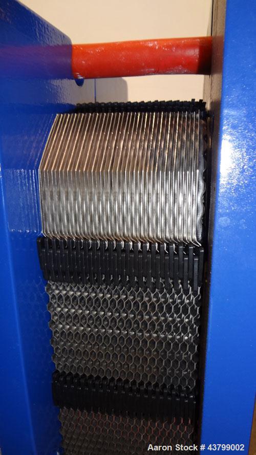 Unused- Alfa Laval Plate Exchanger, 61.35 Square Feet (5.7 Square Meters), Model M6-FG. (40) 316 Stainless steel plates. Designed 10 bar (145 psi) at 60 degrees C (140 F). (2) Inlets, (2) outlets. Mo...