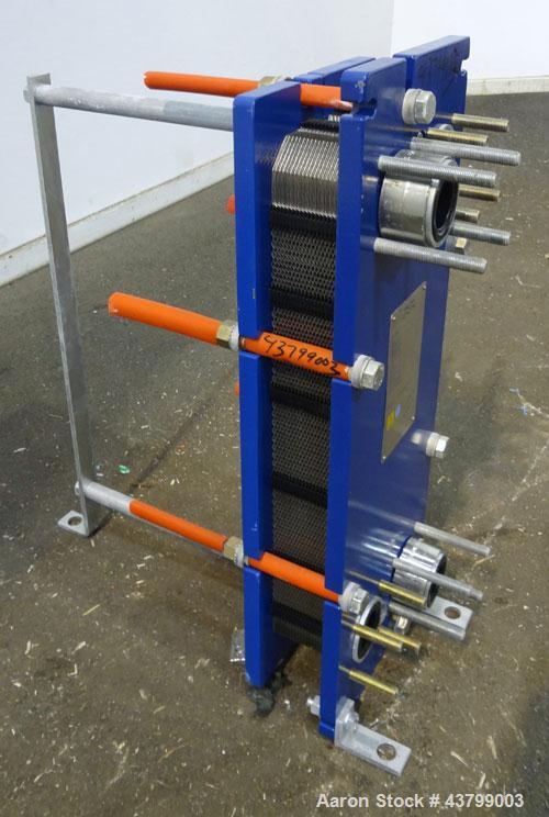 Unused- Alfa Laval Plate Exchanger, 61.35 Square Feet (5.7 Square Meters), Model M6-FG. (40) 316 Stainless steel plates. Designed 10 bar (145 psi) at 60 degrees C (140 F). (2) Inlets, (2) outlets. Mo...