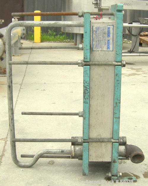Used Alfa Laval Plate Heat Exchanger, model M6-MDFG, 316 stainless steel, 48 square feet. Maximum flow rate 3.52 gallons per minute. (32) Approximate 12" wide x 36" long plates, rated 150 psi at 230 ...