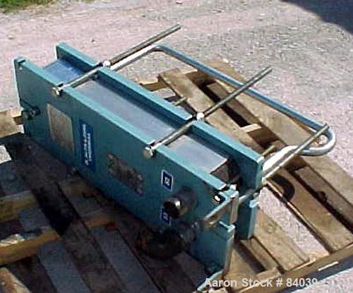 Used Alfa Laval Plate Heat Exchanger, model M6-MDFG, 316 stainless steel, 48 square feet. Maximum flow rate 3.52 gallons per minute. (32) Approximate 12" wide x 36" long plates, rated 150 psi at 230 ...
