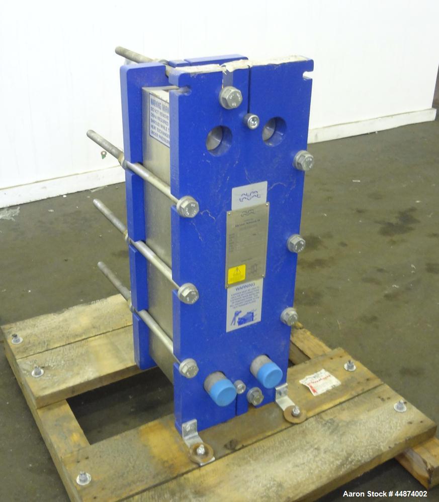 Unused- Alfa Laval Plate Exchanger, Model M6-MFD, 84.4 Square Feet.  (58) 0.60 mm Thick 316 stainless steel plates. Designed 300 psi at -20 to 250 degrees F. (2) 2" Inlets, (2) 2" outlets.  Mounted o...