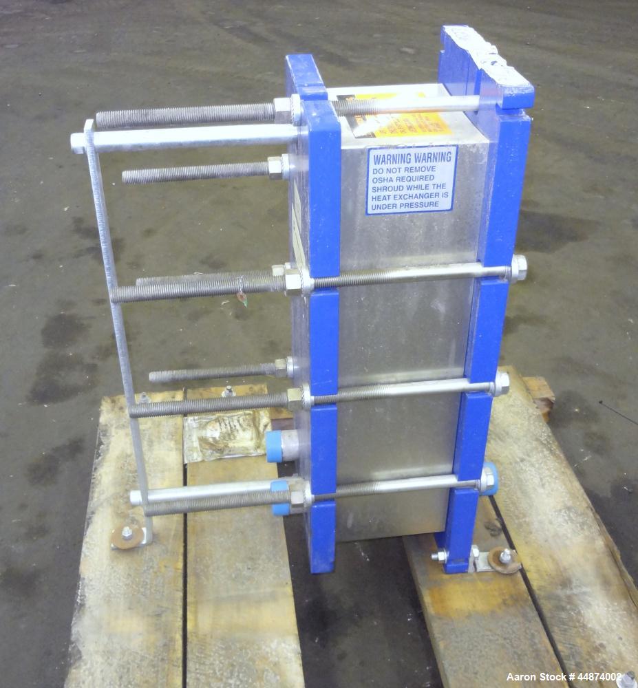 Unused- Alfa Laval Plate Exchanger, Model M6-MFD, 84.4 Square Feet.  (58) 0.60 mm Thick 316 stainless steel plates. Designed 300 psi at -20 to 250 degrees F. (2) 2" Inlets, (2) 2" outlets.  Mounted o...