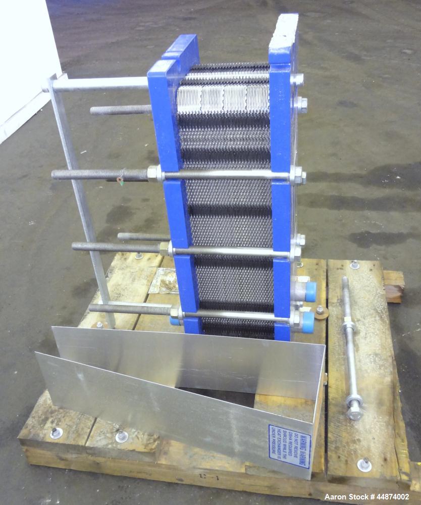 Unused- Alfa Laval Plate Exchanger, Model M6-MFD, 84.4 Square Feet.  (58) 0.60 mm Thick 316 stainless steel plates. Designed 300 psi at -20 to 250 degrees F. (2) 2" Inlets, (2) 2" outlets.  Mounted o...