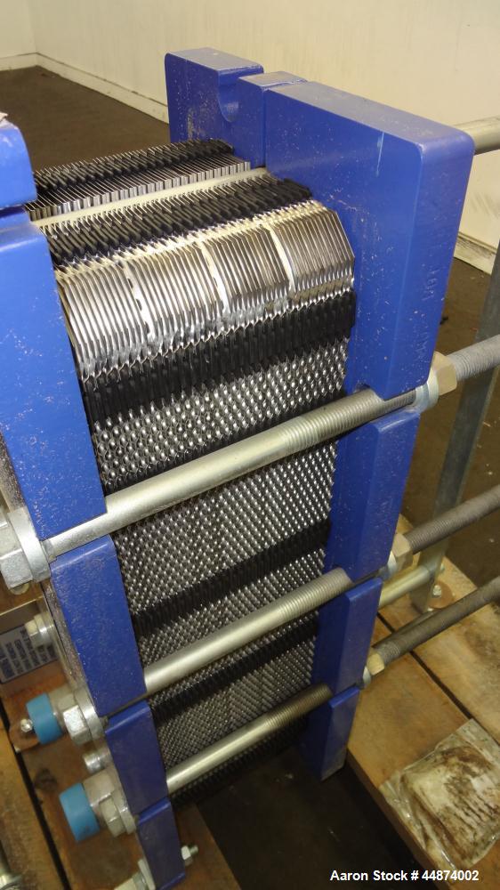 Unused- Alfa Laval Plate Exchanger, Model M6-MFD, 84.4 Square Feet.  (58) 0.60 mm Thick 316 stainless steel plates. Designed 300 psi at -20 to 250 degrees F. (2) 2" Inlets, (2) 2" outlets.  Mounted o...