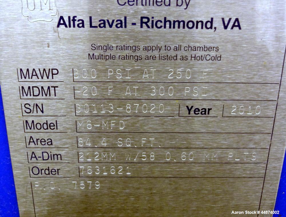 Unused- Alfa Laval Plate Exchanger, Model M6-MFD, 84.4 Square Feet.  (58) 0.60 mm Thick 316 stainless steel plates. Designed 300 psi at -20 to 250 degrees F. (2) 2" Inlets, (2) 2" outlets.  Mounted o...