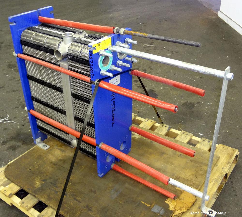 Used Alfa Laval Plate Exchanger, 215 Square Feet, Model M6-MFG.  (146) 0.60 mm thick 316 stainless steel plates, approximately 9-1/2” wide x 29-1/2” tall. Designed 149 psi at 250 degrees F.  (2) 2” I...