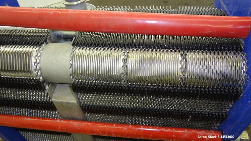 Used Alfa Laval Plate Exchanger, 215 Square Feet, Model M6-MFG.  (146) 0.60 mm thick 316 stainless steel plates, approximately 9-1/2” wide x 29-1/2” tall. Designed 149 psi at 250 degrees F.  (2) 2” I...