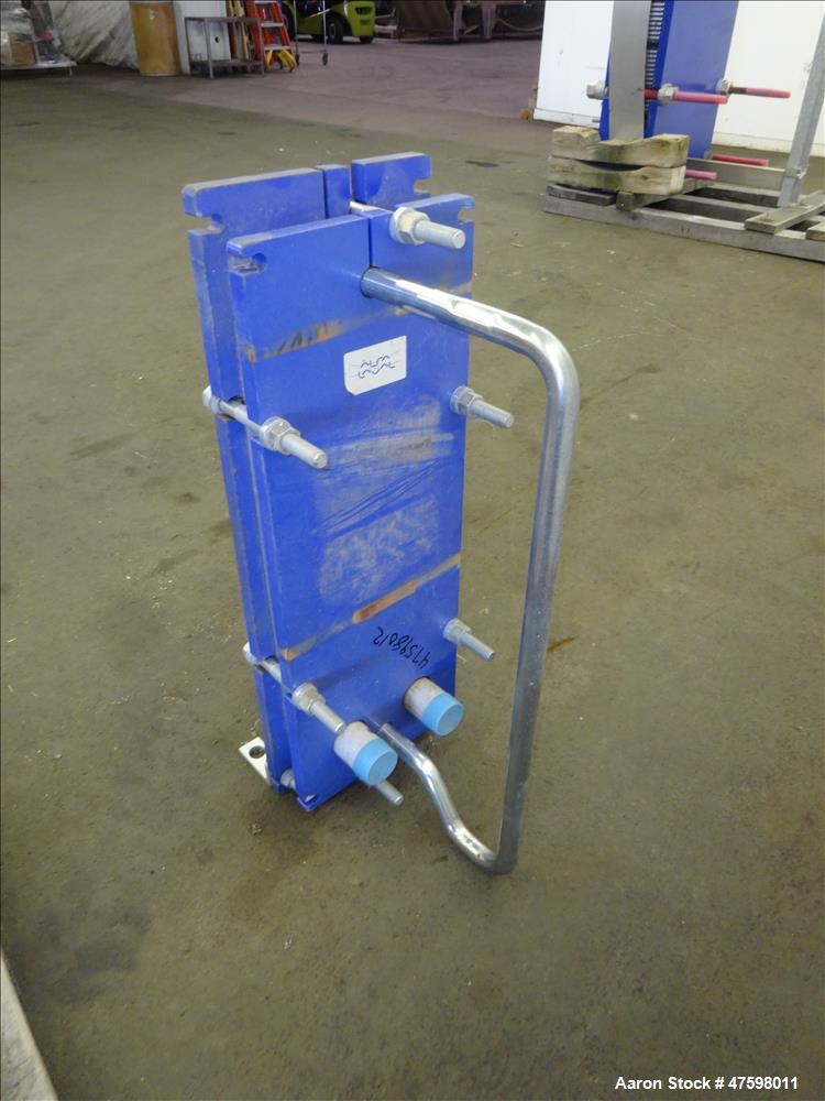 Used Alfa-Laval Plate Exchanger, 16.58 Square Feet, Model M6-MFG. (14) 2" Wide x 28" tall stainless steel plates. Designed 150 psi at -20 to 260 degrees F. 2" Inlet, 2" outlet. Mounted on a carbon st...