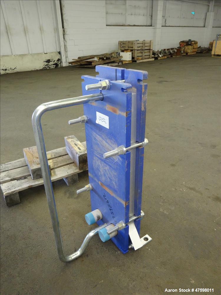 Used Alfa-Laval Plate Exchanger, 16.58 Square Feet, Model M6-MFG. (14) 2" Wide x 28" tall stainless steel plates. Designed 150 psi at -20 to 260 degrees F. 2" Inlet, 2" outlet. Mounted on a carbon st...