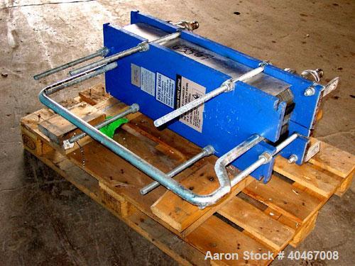 Used Alpha Laval model M6MDFG 58.75 square foot stainless steel plate heat exchanger. A-dim 153mm with (40) .75 mm plates, 2 1/2 in inlet/outlet,  150 PSI @ 230 deg F, (4) eye system.