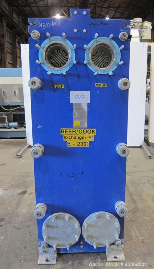 Used Alfa Laval Plate Exchanger, 476.20 Square Feet, Model T20-SFG. (67) Approximately 25” wide x 72” tall x 0.80mm 316 stainless steel plates. Rated 150 psi at -20 to 250 degrees F. (2) 8” Inlet bla...