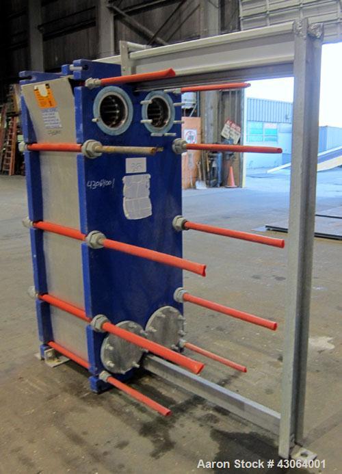 Used Alfa Laval Plate Exchanger, 476.20 Square Feet, Model T20-SFG. (67) Approximately 25” wide x 72” tall x 0.80mm 316 stainless steel plates. Rated 150 psi at -20 to 250 degrees F. (2) 8” Inlet bla...