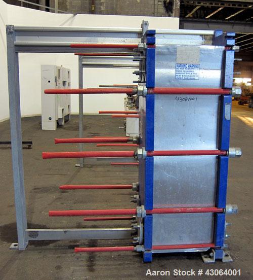 Used Alfa Laval Plate Exchanger, 476.20 Square Feet, Model T20-SFG. (67) Approximately 25” wide x 72” tall x 0.80mm 316 stainless steel plates. Rated 150 psi at -20 to 250 degrees F. (2) 8” Inlet bla...