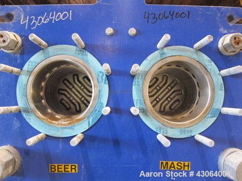 Used Alfa Laval Plate Exchanger, 476.20 Square Feet, Model T20-SFG. (67) Approximately 25” wide x 72” tall x 0.80mm 316 stainless steel plates. Rated 150 psi at -20 to 250 degrees F. (2) 8” Inlet bla...