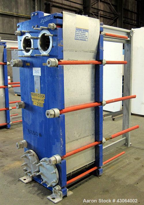Used Alfa Laval Plate Exchanger, 476.20 Square Feet, Model T20-SFG. (67) Approximately 25” wide x 72” tall x 0.80mm 316 stainless steel plates. Rated 150 psi at -20 to 250 degrees F. (2) 8” Inlet bla...