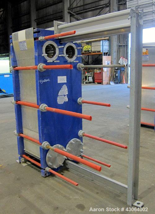 Used Alfa Laval Plate Exchanger, 476.20 Square Feet, Model T20-SFG. (67) Approximately 25” wide x 72” tall x 0.80mm 316 stainless steel plates. Rated 150 psi at -20 to 250 degrees F. (2) 8” Inlet bla...