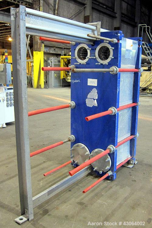 Used Alfa Laval Plate Exchanger, 476.20 Square Feet, Model T20-SFG. (67) Approximately 25” wide x 72” tall x 0.80mm 316 stainless steel plates. Rated 150 psi at -20 to 250 degrees F. (2) 8” Inlet bla...