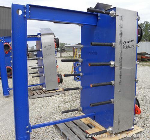 Used Alfa Laval Vicarb Plate Exchanger, 769.6 Square Feet, Model V110-SST-100. Duty 6577 KBTU/H. (67) Approximately 36’’ wide x 60’’ tall 316 stainless steel plates. Designed 150 psi at 20 to 150 deg...