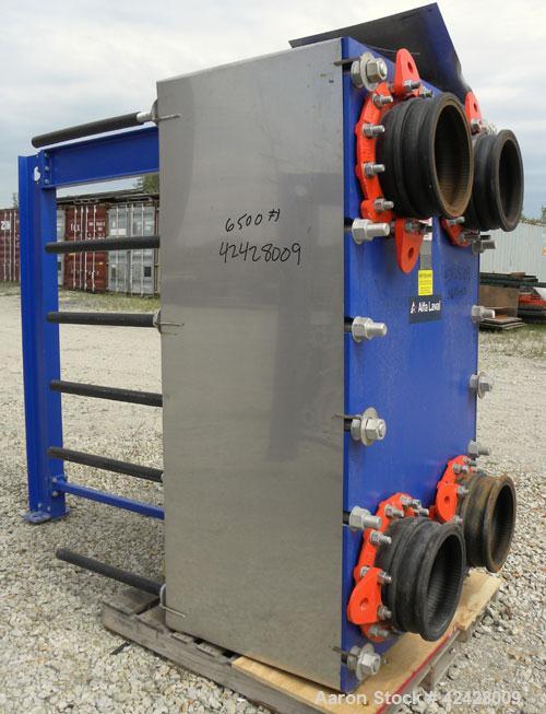 Used Alfa Laval Vicarb Plate Exchanger, 1610.3 Square Feet, Model V110-SST-200. Duty 12780 KBTU/H. (139) Approximately 36’’ wide x 60’’ tall 316 stainless steel plates. Designed 150 psi at 20 to 150 ...