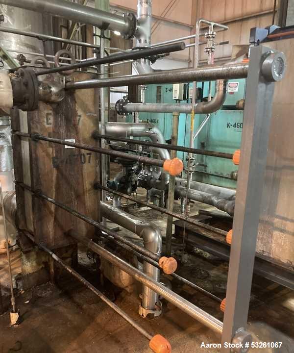 Used Alfa Laval Stainless Steel Plate And Frame Heat Exchanger, approximate 1000 Sq. Ft., E-4707. Stainless steel Plates. No visible Name Plate, Sq. Ft. is approximate.