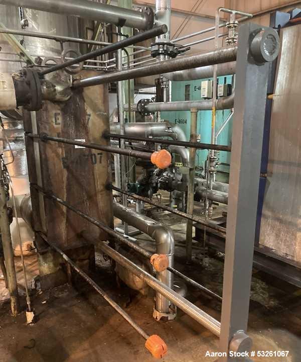 Used Alfa Laval Stainless Steel Plate And Frame Heat Exchanger, approximate 1000 Sq. Ft., E-4707. Stainless steel Plates. No visible Name Plate, Sq. Ft. is approximate.