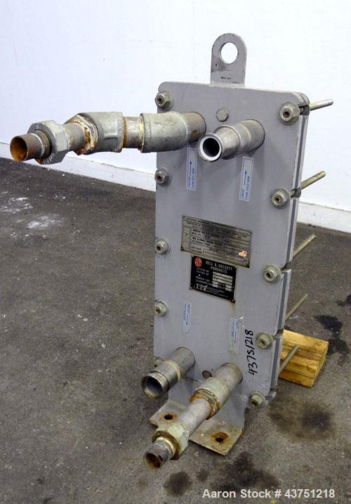 Used Bell & Gossett Plate Exchanger, 9.10 Square Feet, Model GPX-130-007. (7) 304 Stainless steel plates. Designed 115 psi at 225 degrees F. (2) 2” Inlets, (2) 2” outlets. Mounted on a carbon steel e...