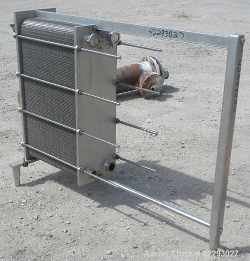 Used Cherry Burrell Thermaflex Plate Heat Exchanger, model 217SBL, 316 stainless steel. Approximately 247 square feet, 20.8 gallons. (130) approximatly 10" wide x 36" long plates. 3’’ tri-clamp inlet...