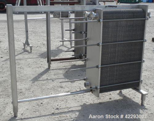 Used Cherry Burrell Thermaflex Plate Heat Exchanger, model 217SBL, 316 stainless steel. Approximately 247 square feet, 20.8 gallons. (130) approximatly 10" wide x 36" long plates. 3’’ tri-clamp inlet...