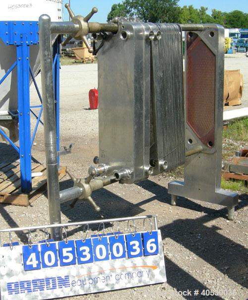 Used- Cherry Burrell Plate Heat Exchanger, Model SLAS-100. Approximately 250 square feet, 304 stainless steel. (94) 13 1/2" ...