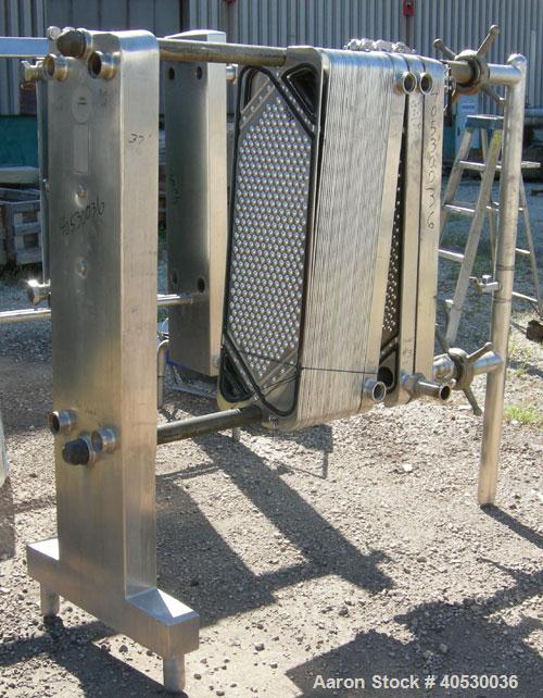 Used- Cherry Burrell Plate Heat Exchanger, Model SLAS-100. Approximately 250 square feet, 304 stainless steel. (94) 13 1/2" ...