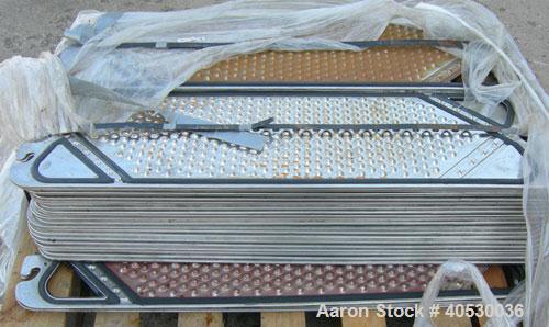 Used Cherry Burrell Plate Heat Exchanger, Model SLAS-100. Approximately 250 square feet, 304 stainless steel. (94) 13 1/2" wide x 45" long plates. 2" inlet/outlet. 2 hand wheel type tightening bars. ...