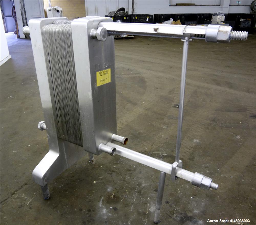 Used De Laval APV Paraflow Plate Heat Exchanger, Type HX, Approxmiate 150 square feet. (70) 9" wide x 36" long 316 Stainless steel plates. (8) 2" Diameter inlets/outlets. No pressure or temperature r...