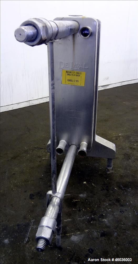 Used De Laval APV Paraflow Plate Heat Exchanger, Type HX, Approxmiate 150 square feet. (70) 9" wide x 36" long 316 Stainless steel plates. (8) 2" Diameter inlets/outlets. No pressure or temperature r...